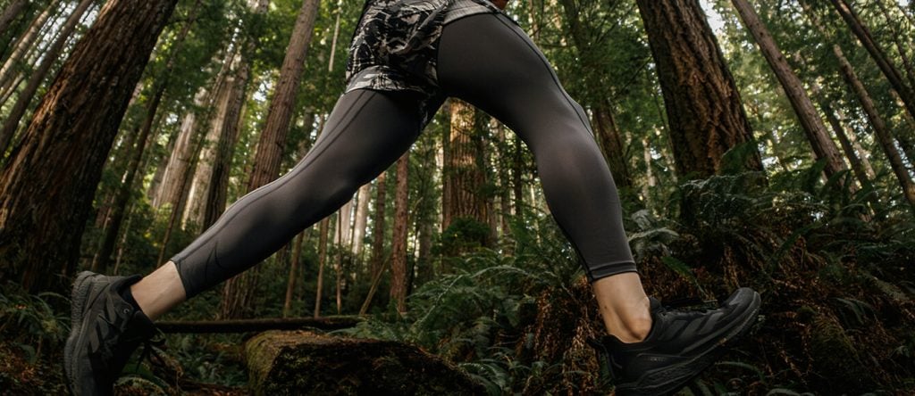 athlete running in the trail